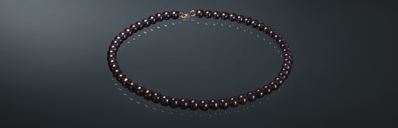 Ожерелье из чёрного с фиолетовым отливом пресноводного жемчуга, с замком из золота 585˚. ч8505х40з